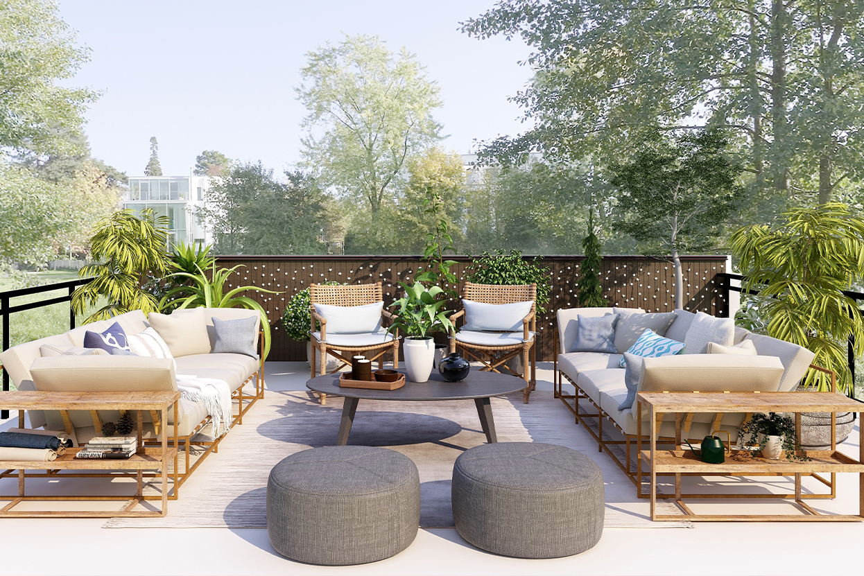 Grünes Wohnzimmer - Terrasse mit Gartenmöbeln im Grünen