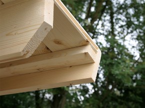 Finnhaus Wolff Holz Anbauschuppen 28-A - 28mm Blockbohlenhaus - Satteldach - natur