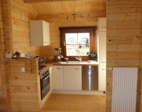 Finnhaus Wolff Holz-Ferienhaus Spessart 5887 92 - 92mm Blockhaus - Satteldach - natur