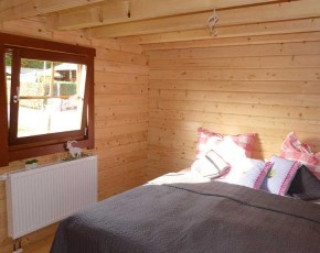 Finnhaus Wolff Holz-Ferienhaus Spessart 5887 92 - 92mm Blockhaus - Satteldach - natur